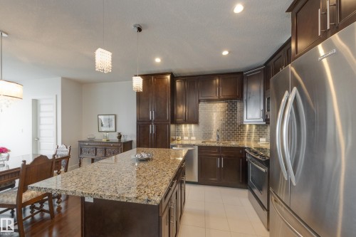 #403 1350 Windermere Wy Sw, Edmonton, AB - Indoor Photo Showing Kitchen With Stainless Steel Kitchen With Upgraded Kitchen