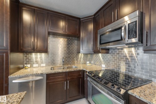 #403 1350 Windermere Wy Sw, Edmonton, AB - Indoor Photo Showing Kitchen With Stainless Steel Kitchen With Double Sink With Upgraded Kitchen