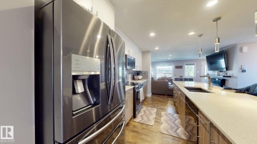 17359 49 Street Nw, Edmonton, AB - Indoor Photo Showing Kitchen With Double Sink With Upgraded Kitchen