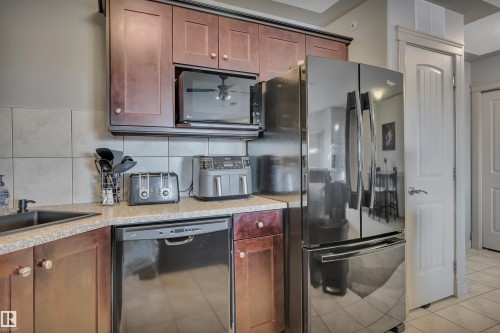 #411 4415 48 St, Leduc, AB - Indoor Photo Showing Kitchen