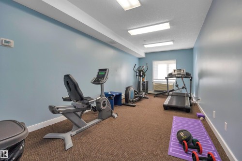 #411 4415 48 St, Leduc, AB - Indoor Photo Showing Gym Room