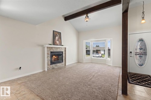 5003 43 Street, Cold Lake, AB - Indoor Photo Showing Living Room With Fireplace