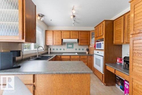 5003 43 Street, Cold Lake, AB - Indoor Photo Showing Kitchen With Double Sink