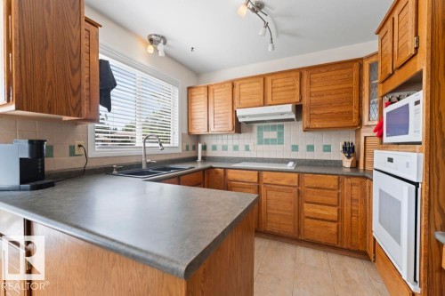 5003 43 Street, Cold Lake, AB - Indoor Photo Showing Kitchen With Double Sink