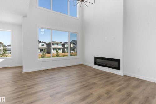 2224 5 Avenue Nw, Edmonton, AB - Indoor Photo Showing Living Room With Fireplace