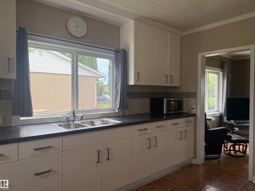 5113 Fifth Street, Boyle, AB - Indoor Photo Showing Kitchen With Double Sink