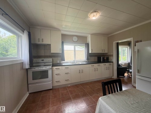 5113 Fifth Street, Boyle, AB - Indoor Photo Showing Kitchen With Double Sink