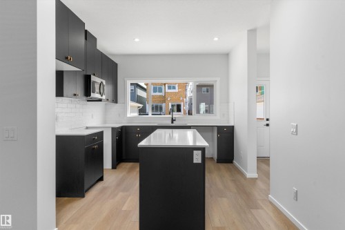 2463 Alces Link Sw, Edmonton, AB - Indoor Photo Showing Kitchen