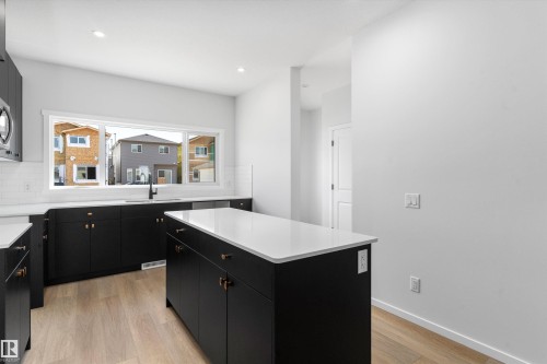 2463 Alces Link Sw, Edmonton, AB - Indoor Photo Showing Kitchen