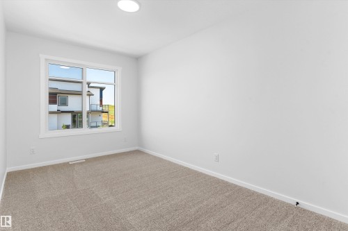 2463 Alces Link Sw, Edmonton, AB - Indoor Photo Showing Other Room