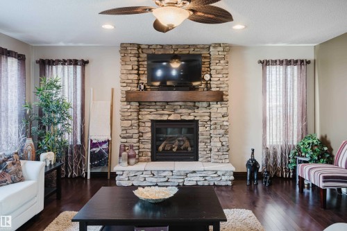 9729 159 Street Nw, Edmonton, AB - Indoor Photo Showing Living Room With Fireplace