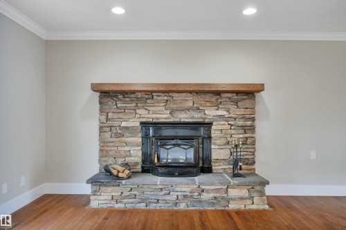2412 112A Street, Edmonton, AB - Indoor Photo Showing Living Room With Fireplace