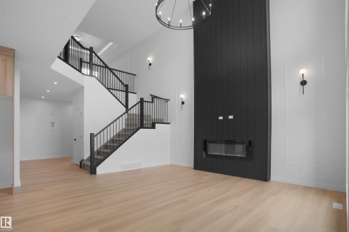 955 Elderberry Landing Nw, Edmonton, AB - Indoor Photo Showing Other Room With Fireplace