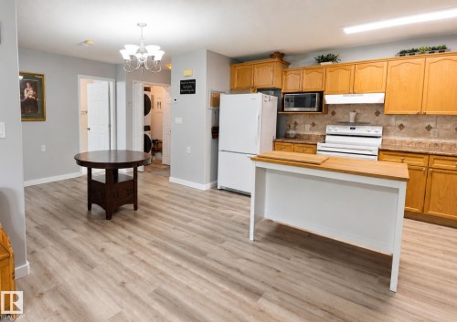 #10 5011 Pine Dr, Cherry Grove, AB - Indoor Photo Showing Kitchen