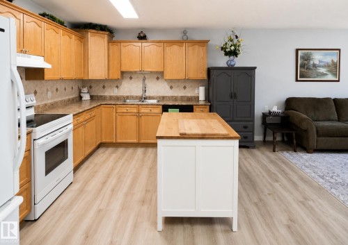 #10 5011 Pine Dr, Cherry Grove, AB - Indoor Photo Showing Kitchen With Double Sink