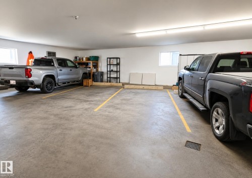 #10 5011 Pine Dr, Cherry Grove, AB - Indoor Photo Showing Garage