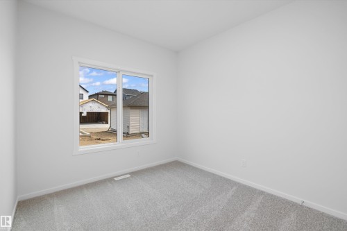 9105 Elves Loop Nw, Edmonton, AB - Indoor Photo Showing Other Room