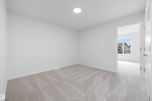 9105 Elves Loop Nw, Edmonton, AB - Indoor Photo Showing Other Room