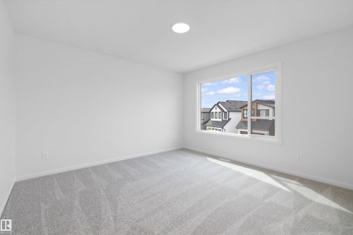 9105 Elves Loop Nw, Edmonton, AB - Indoor Photo Showing Other Room