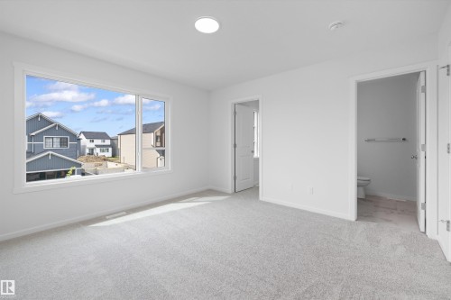 9105 Elves Loop Nw, Edmonton, AB - Indoor Photo Showing Other Room