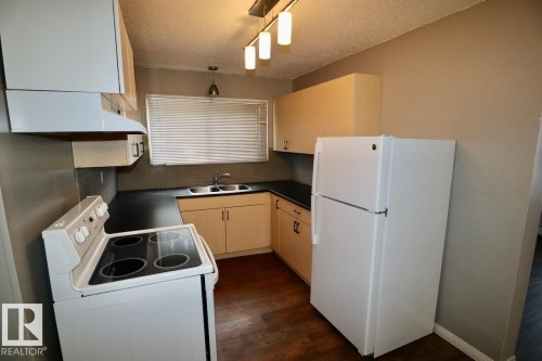 #D 4432 47 St, Leduc, AB - Indoor Photo Showing Kitchen With Double Sink