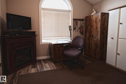 451066 Range Road 73, Rural Wainwright M.D., AB - Indoor With Fireplace