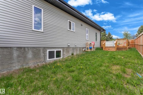 Exterior siding in a neutral gray hue - 4506 49 Avenue, Beaumont, AB - Outdoor