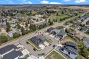 Aerial perspective showcasing a residential area with varied housing styles - 4506 49 Avenue, Beaumont, AB  - Outdoor With View 