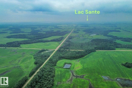 Expansive aerial landscape featuring extensive green fields and dense tree lines - Sw-28-56-10 -W4, Rural St. Paul County, AB 