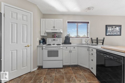 1303 5 Avenue, Cold Lake, AB - Indoor Photo Showing Kitchen With Double Sink