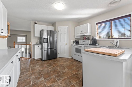1303 5 Avenue, Cold Lake, AB - Indoor Photo Showing Kitchen With Double Sink