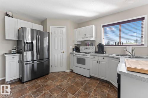 1303 5 Avenue, Cold Lake, AB - Indoor Photo Showing Kitchen With Double Sink