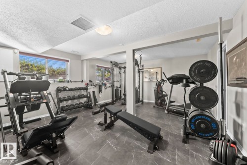 1303 5 Avenue, Cold Lake, AB - Indoor Photo Showing Gym Room
