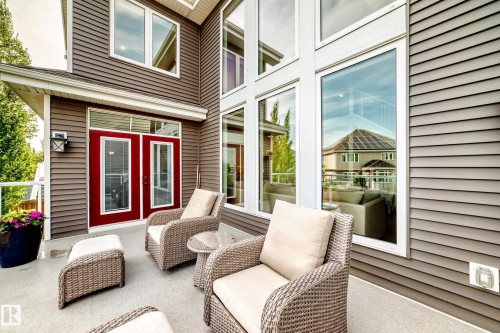 9034 24 Ave Sw, Edmonton, AB - Indoor Photo Showing Living Room With Fireplace