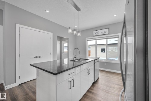 53 Dillingham Avenue, Fort Saskatchewan, AB - Indoor Photo Showing Kitchen With Double Sink