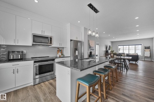 53 Dillingham Avenue, Fort Saskatchewan, AB - Indoor Photo Showing Kitchen With Upgraded Kitchen
