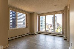 Expansive window wall with cityscape scenery - 