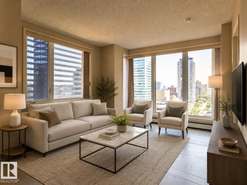 Spacious living area featuring expansive windows, wood-finish flooring, and a textured ceiling - #1501 10180 104 St Nw, Edmonton, AB - Indoor Photo Showing Living Room