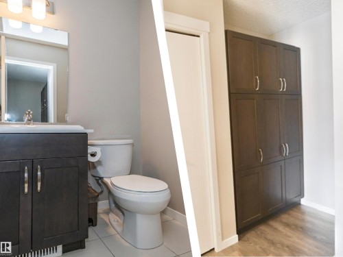 Bathroom featuring a dark wood-finish vanity with chrome hardware, a rectangular mirror, and a three-light vanity fixture. Also beside the bathroom is built-in storage. - 17263 9 Avenue Sw, Edmonton, AB 