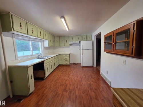 4812 48 Avenue, Cold Lake, AB - Indoor Photo Showing Kitchen With Double Sink