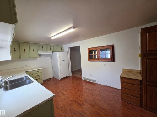 4812 48 Avenue, Cold Lake, AB - Indoor Photo Showing Kitchen With Double Sink