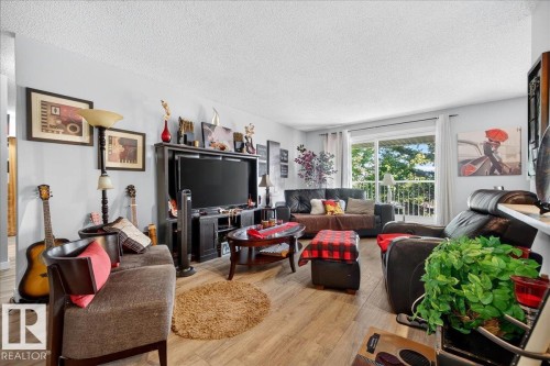 #406 5125 Riverbend Rd Nw, Edmonton, AB - Indoor Photo Showing Living Room