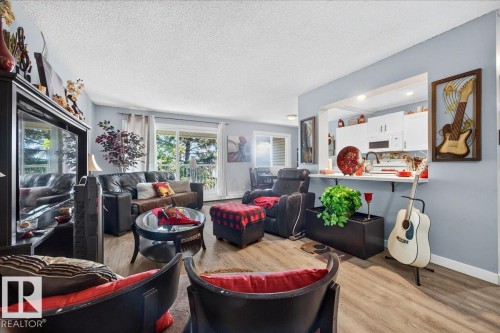 #406 5125 Riverbend Rd Nw, Edmonton, AB - Indoor Photo Showing Living Room