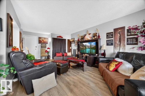 #406 5125 Riverbend Rd Nw, Edmonton, AB - Indoor Photo Showing Living Room