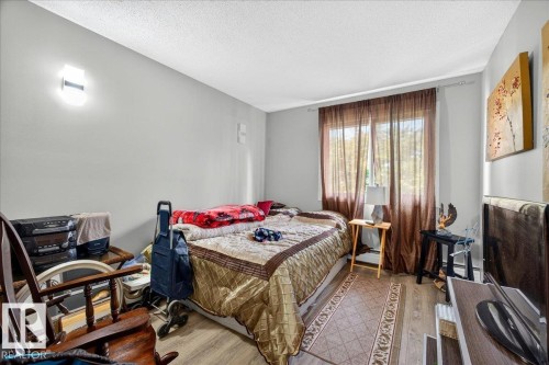 #406 5125 Riverbend Rd Nw, Edmonton, AB - Indoor Photo Showing Bedroom