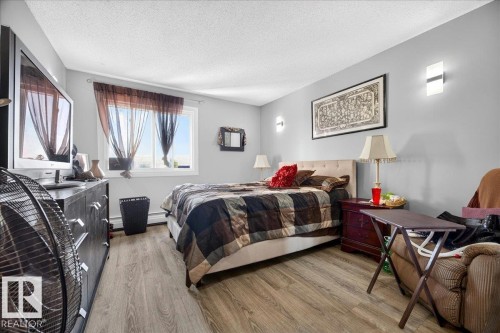 #406 5125 Riverbend Rd Nw, Edmonton, AB - Indoor Photo Showing Bedroom