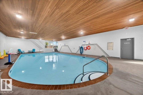 #406 5125 Riverbend Rd Nw, Edmonton, AB - Indoor Photo Showing Other Room With In Ground Pool