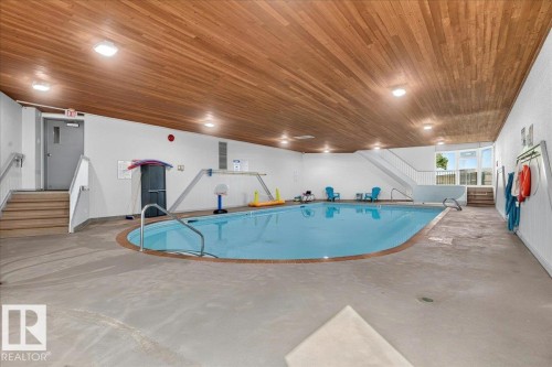 #406 5125 Riverbend Rd Nw, Edmonton, AB - Indoor Photo Showing Other Room With In Ground Pool