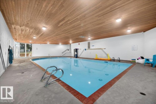 #406 5125 Riverbend Rd Nw, Edmonton, AB - Indoor Photo Showing Other Room With In Ground Pool