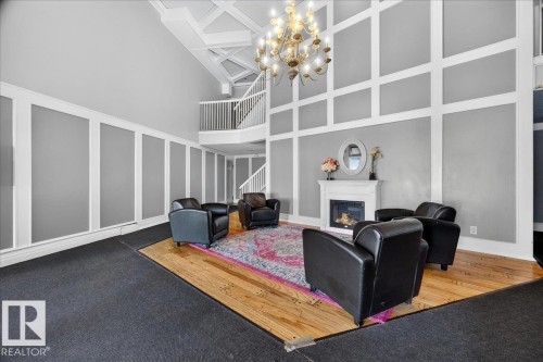 #406 5125 Riverbend Rd Nw, Edmonton, AB - Indoor With Fireplace